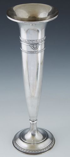 Weighted Sterling Trumpet Vase, early 20th c., by Mauser, #1426, of tapering form, with repousse decoration, on an integral stepped circular base, H.-