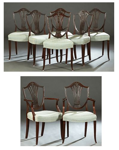 Set of Eight (6 +2) Carved Mahogany Hepplewhite Style Shield Back Dining Chairs, 20th c., the arched back with a carved pierced fan style vertical spl