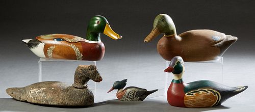 Four Duck Decoys, 20th c., one Dogris marked Hogarth; 2 blue winged teal; and a widgeon; together with a diminutive carved "First Merganser," 1975, by
