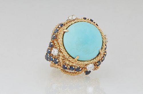 Lady's 18K Yellow Gold Dinner Ring, with a cabochon circular app 8 carat Persian turquoise, atop a twisted gold border over pierced swirling sides mou