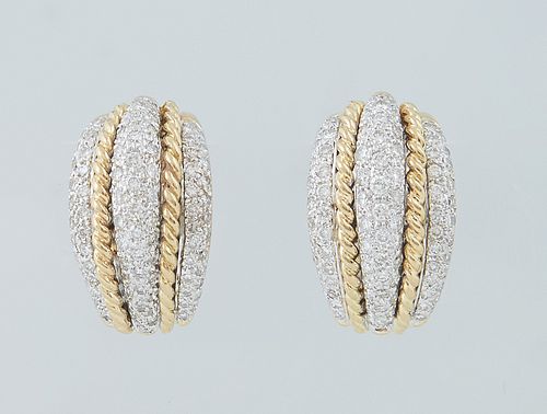 Vintage Pair of 18K White Gold Clip Hoop Earrings, the half hoop with an arched center row of three round diamonds, bordered by twisted gold bands and