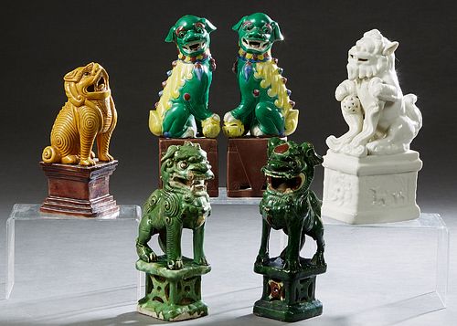 Group of Six Glazed Foo Lion Figures on Plinths, consisting of a near pair of Green examples; a pair of green and yellow examples; a blanc de Chine ex