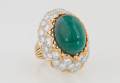 Lady's 18K Yellow Gold Dinner Ring, with an app. 11 ct. oval cabochon emerald within a gold crown mount over sloping sides with zigzag rows of round d