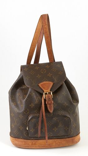 Louis Vuitton Brown Monogram Coated Canvas MM Montsouris Backpack, the exterior with a small zip pouch in the front and vachetta leather adjustable st