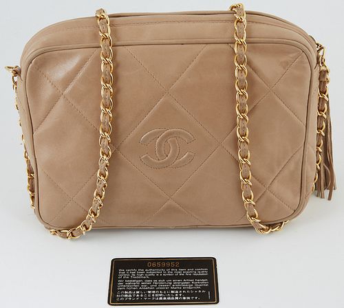 Chanel Beige Large Quilted Calf Leather Camera Tussle Bag, c. 1986-1988, the gold chain interlaced with beige leather, the exterior with beige stitchi