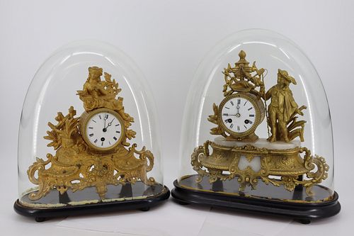 Two French Gilt Bronze Clocks In Glass Domes