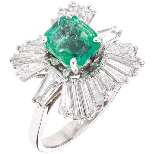 RING WITH EMERALD AND DIAMONDS IN 14K WHITE GOLD 1 Octagonal cut emerald ~1.0 ct and 22 Baguette cut diamonds~2.40 ct