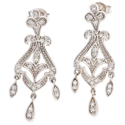 PAIR OF EARRINGS WITH DIAMONDS IN 14K WHITE GOLD 50 Brilliant cut diamonds ~0.50 ct. Weight: 4.8 g. Size: 0.4 x 1.2" (1.1 x 3.1 cm)