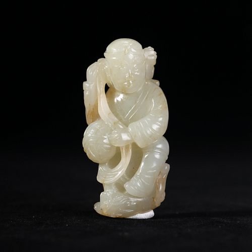 A WHITE JADE CARVING OF A FOREIGNER