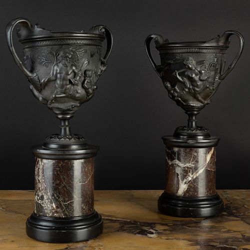 Pair of Two-Handled Bronze Urns on Marble Bases 