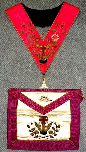 A Rose Croix Masonic apron and collar, heavily embroidered, the collar suspended with a gemset jewel