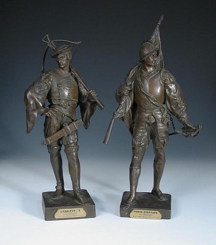 After Emile Picault, a pair of bronze standing figures of an archer and standard bearer, titled in F