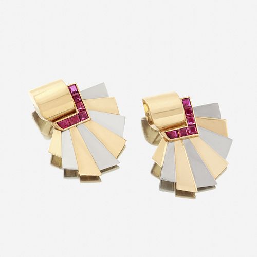 A pair of Retro eighteen karat bicolor gold and ruby ear clips