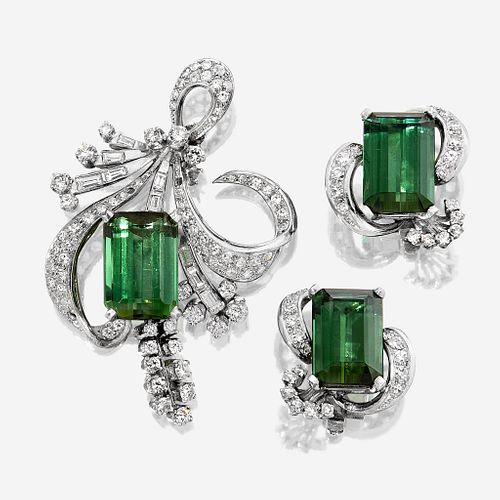 A pair of green tourmaline, diamond, and platinum ear clips and brooch