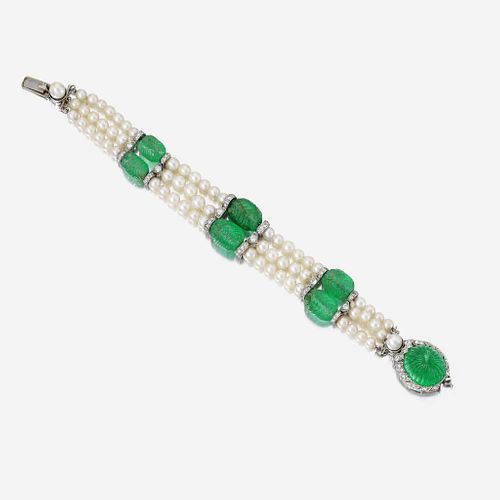 An Art Deco carved emerald, pearl, and diamond bracelet
