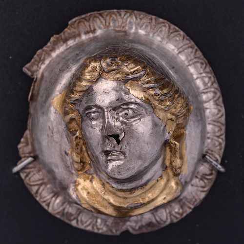 A Thracian Gilt-Silver Tondo of a Female Bust
Diameter 1 1/4 inches. 