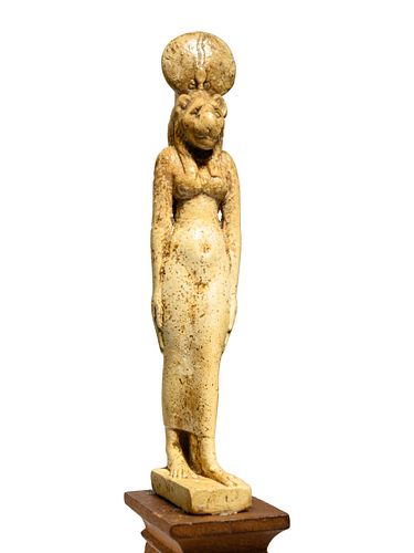 An Egyptian Faience Sekhmet
Height 4 1/2 inches.