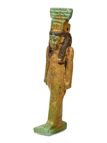 An Egyptian Two-Tone Faience Nephthys  
Height 3 1/2 inches. 