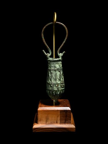 An Egyptian Bronze Situla
Height 8 1/4 inches. 