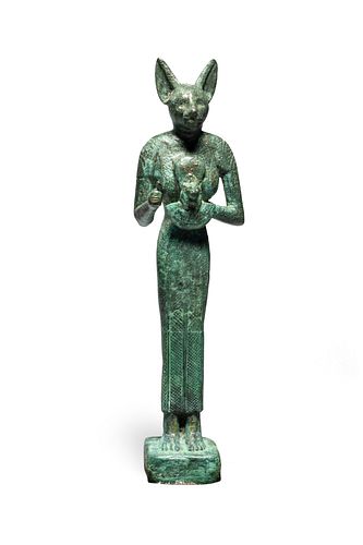 An Egyptian Bronze Bastet
Height 5 1/4 inches.