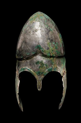 A Chalcidian Tinned Bronze Helmet
Height 14 inches.