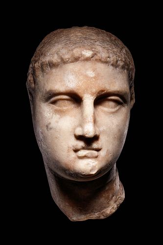 A Greek Marble Portrait Head of Ptolemy III
Height 7 3/4 inches. 