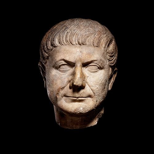 A Roman Marble Portrait Head of Emperor Trajan
Height 11 inches. 