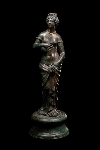 A Roman Bronze Venus
Height 8 3/4 inches. 