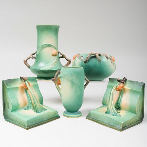 Three Roseville Pottery Glazed 'Pinecone' Vases and a Pair of Book Ends