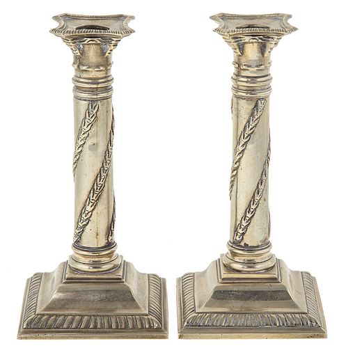 A Pair of George III Paktong Candlesticks