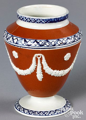 Mocha urn, with relief swags on an umber ground