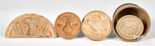 Four carved butterprints, 19th c.