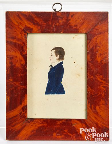 Miniature watercolor profile portrait of a boy