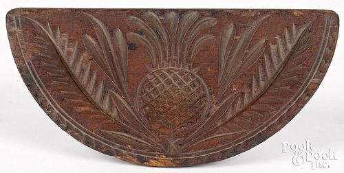 Carved pine half round butterprint, 19th c.