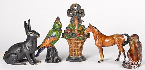 Five painted cast iron doorstops, early 20th c.