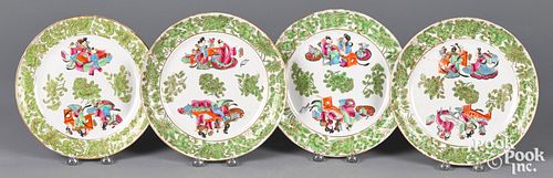 Four Chinese export porcelain famille rose plates