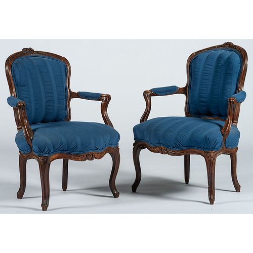 A Pair of French Louis XV Style Fruitwood Fauteuils