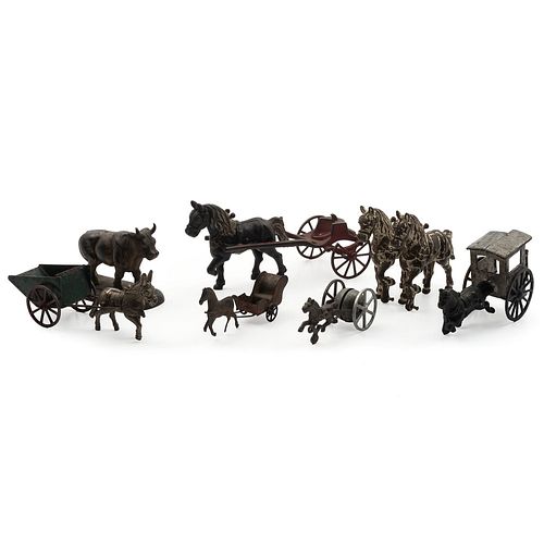 Seven Cast Iron and Pressed Tin Horse Drawn Toys