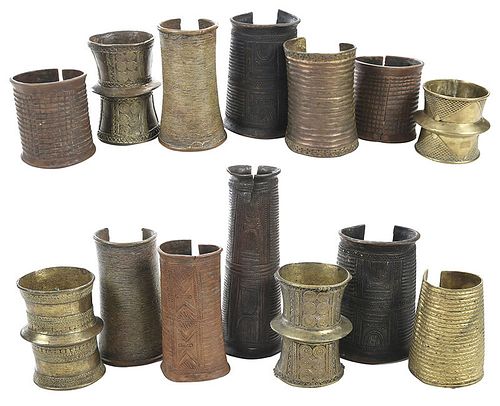 Group of 14 African Bronze Bangles and Cuffs