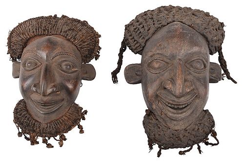 Two Carved Wood and Fiber Oku Kam Masks