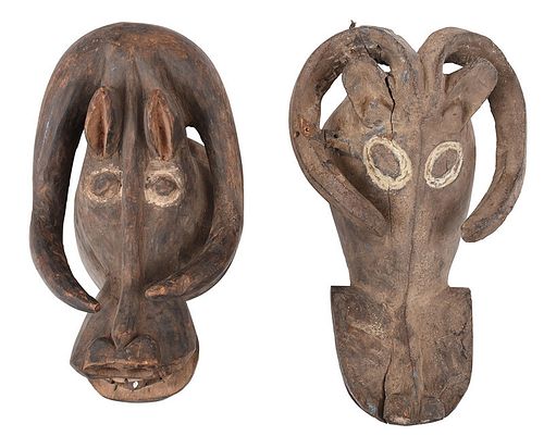Two West African Carved and Painted Ram Masks