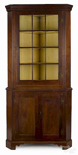 Pennsylvania walnut corner cupboard, ca. 1800,