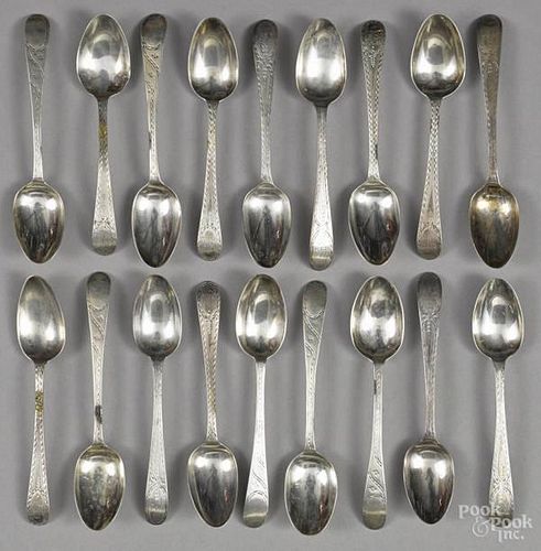 Eighteen English bright cut silver teaspoons, ca