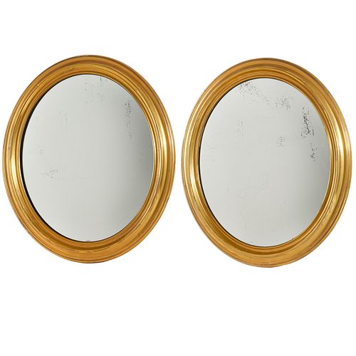 Pair English brass oval convex mirrors