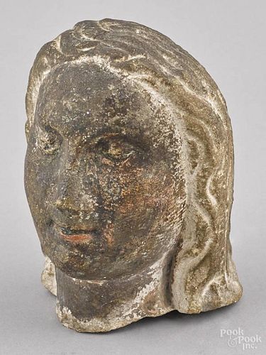 New England carved and painted stone head of a w
