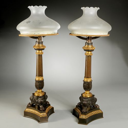 Pair Charles X bronze sinumbra lamps