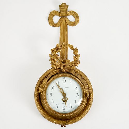 Bagues & Fils Louis XVI style ormolu cartel clock