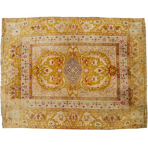 Antique room-size Agra carpet