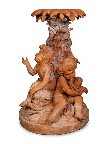 An Italian Terracotta Figural Fountain
Height 70 x diameter 36 inches.