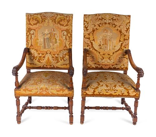 A Pair of Louis XIII Style Carved Walnut Needlepoint Upholstered Chairs
Height 47 x width 25 x depth 26 inches.